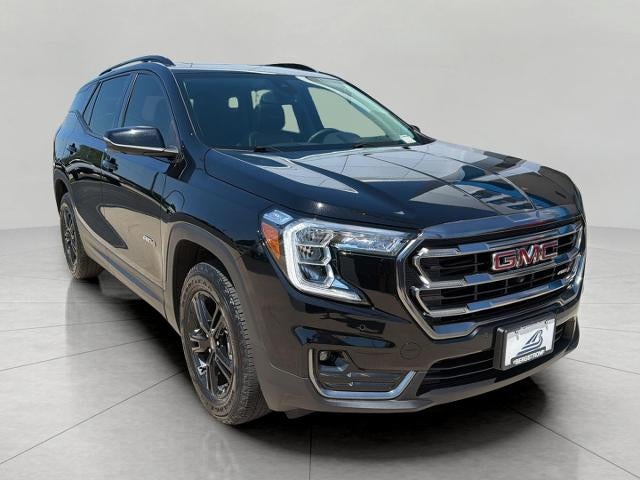 2024 GMC Terrain AT4 in Ebony Twilight Metallic — front three-quarter view
